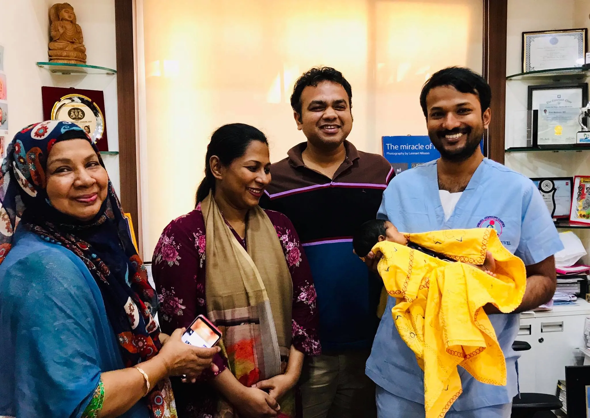 Happy family with newborn baby after azoospermia fertility treatment at Iswarya Fertility Centre